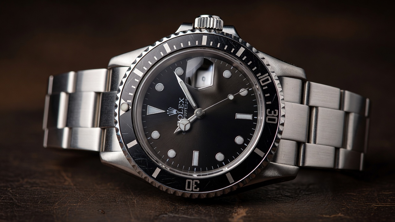 Vintage Rolex Submariner diver watch with aged patina dial